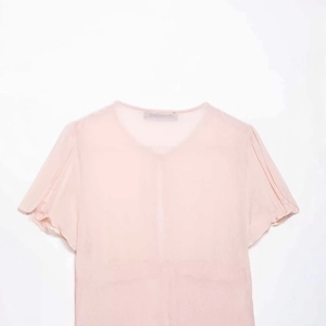 Elegant light pink chiffon short sleeve blouse with round neck for casual summer wear