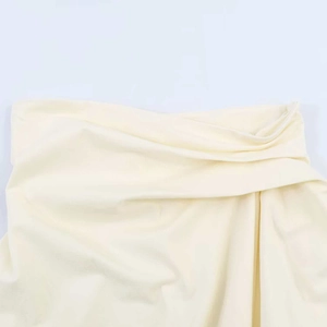 Women's summer sexy pleated tube top in cream beige ribbed knit fabric close-up