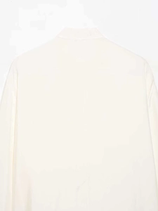 Detailed back view of white stand collar long sleeve shirt showing high-density cotton texture