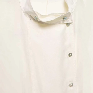 Elegant ivory high-collar long-sleeved shirt with side shell buttons and fine texture