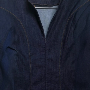 Deep blue denim puff sleeve mini dress with contrast stitching and invisible zipper detail