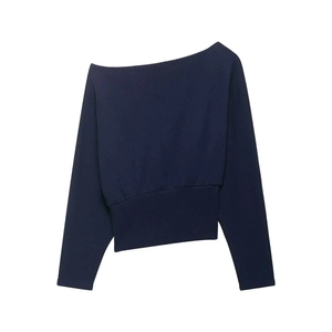 Flat lay of navy blue asymmetric off-shoulder knit top with wide ribbed waist details