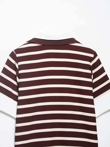 Detail of the knit texture and striped pattern on this burgundy short sleeve polo shirt
