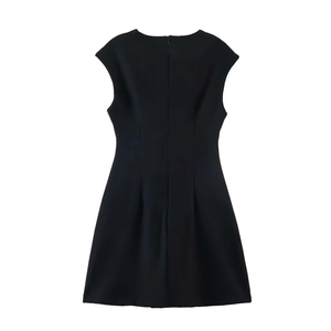 Detail view of the back of a black sleeveless A-line dress with invisible zipper and seams