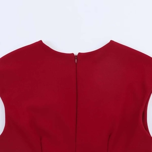 Detail view of a wine red sleeveless dress showing the invisible back zipper and fine fabric