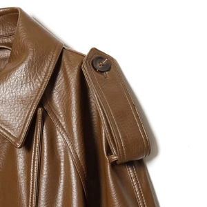 Caramel double-breasted faux leather jacket with classic lapel and shoulder epaulettes