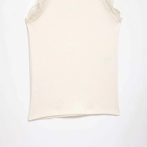 Elegant cream ribbed knit tank top with delicate lace trim and high neckline for women