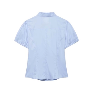 Women's light blue poplin shirt featuring short puff sleeves and back stitch detail