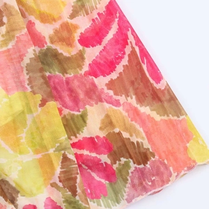 Macro detail of the lightweight floral print fabric with high-quality hem finishing