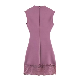 Detail view of purple sleeveless dress with elegant lace hem and back zipper closure