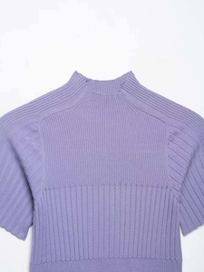 Detail of light purple ribbed knit top showing mockup of high neck and soft texture