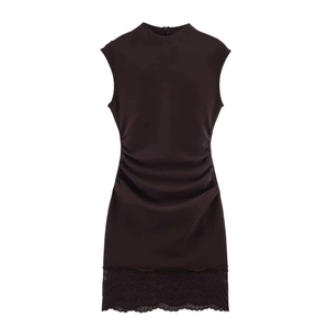 Slim fit sleeveless high neck dark dress with side ruching and delicate lace hem detail