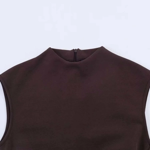 Close-up of chocolate brown mock neck dress with a seamless back invisible zipper detail