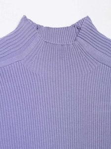 Detail of ribbed knit texture and mock neck collar on a lilac sleeveless top