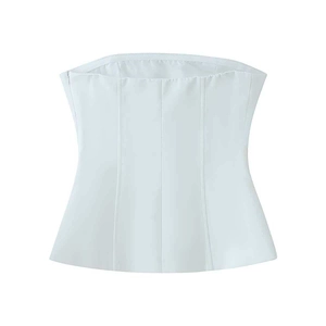 Detailed view of white corset top with vertical stitching and side zipper closure
