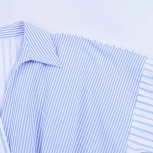 Detail of blue and white striped poplin shirt collar with clean shoulder stitching