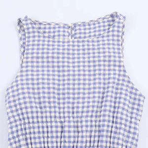 Sleeveless blue gingham midi dress with round neck and elastic waist on white background