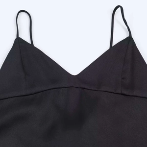 Elegant black asymmetric satin camisole top with minimalist straps and deep V-neckline