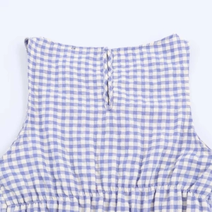 Detail view of blue gingham dress with keyhole back and elastic pleated waist