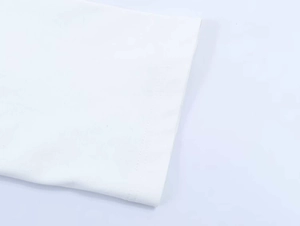 Close-up of white knit fabric texture and high-quality double-needle flat stitching detail