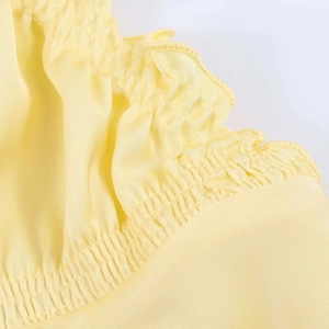 Elegant yellow satin midi dress with delicate shirring and ruffle details for a chic look