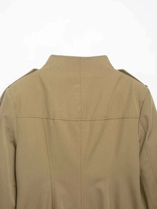 Detailed back view of khaki stand collar utility jacket with shoulder epaulette detail