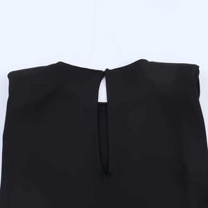 Close-up of black sleeveless dress with neat stitching and back cutout detail