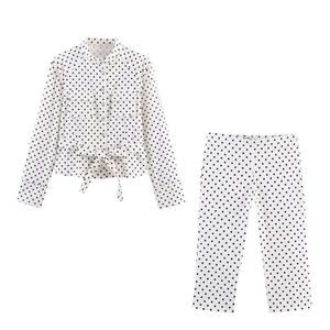 Vintage polka dot two-piece set featuring long sleeve button shirt and straight pants