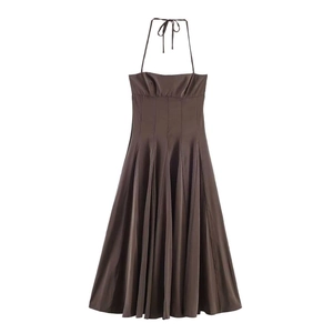 Detailed view of dark brown satin halter midi dress with elegant pleated draping