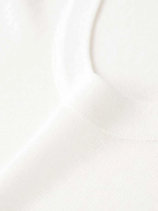 Detail shot showing the fine texture and high-quality knit of the white slim-fit sweater
