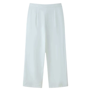Detail view of white high-waisted wide-leg pants with pleated waist and straight cut