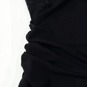 Black lace dress for women featuring delicate floral lace trim and pleated chiffon fabric
