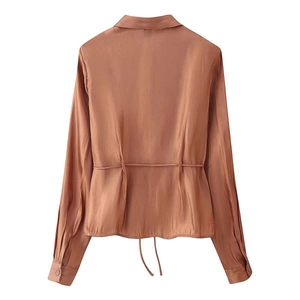 Caramel satin long-sleeve shirt with drawstring waist and elegant glossy finish