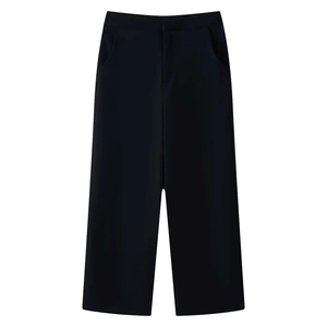 Detail view of high-waist black wide-leg trousers with clean zipper and side pockets