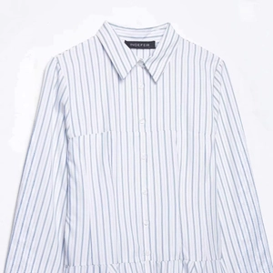 Vertical striped light blue midi shirt dress with button-down front and long sleeves
