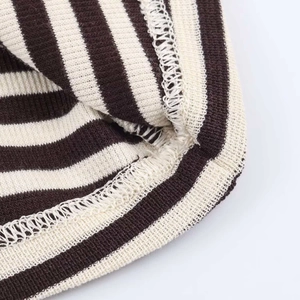 Close-up of minimalist striped short sleeve t-shirt with premium ribbed fabric texture