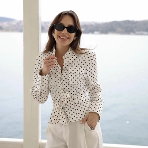 Polka dot long sleeve shirt with tie-waist and utility pockets for women