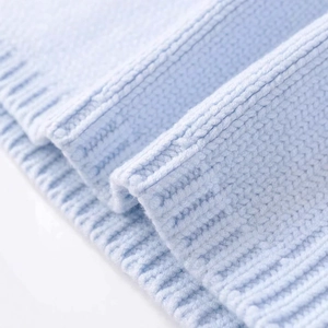 Minimalist light blue knitted tank top with detailed rib texture and crew neck design