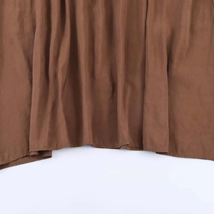 Elegant dark brown midi dress with high waist design and textured pleated fabric detail