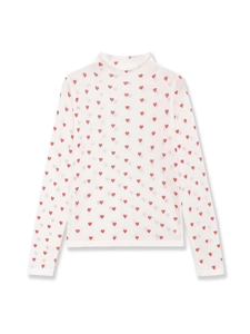 Close-up of semi-transparent white mesh fabric featuring red heart prints and mock neck