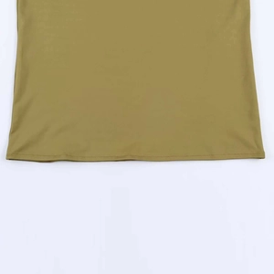 Detailed close-up of olive green slim dress showing precision stitching and fabric texture