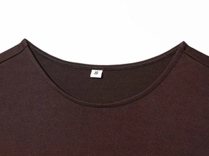 Close-up of the round neckline and size S label on a dark brown satin knit dress