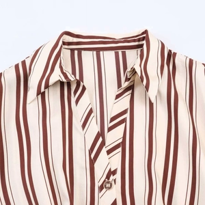 Elegant brown striped v-neck midi dress with lapel collar and button detail for women