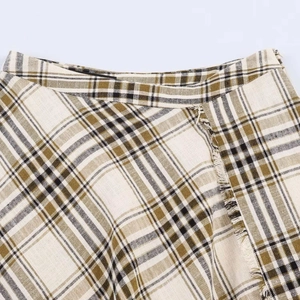 Women's minimalist asymmetric plaid skirt in beige and olive green with fringe hem