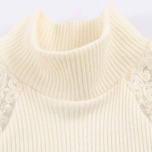 Sleeveless rib-knit tank top with mock neck and delicate floral lace shoulder details
