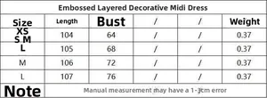 Size guide table for embossed layered midi dress with measurements in centimeters