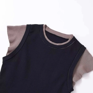 Minimalist knit top featuring a double-layered round neck and contrast cap sleeves