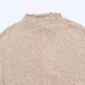 Close-up detail of high-collar neckline and fine knit texture on casual summer maxi dress