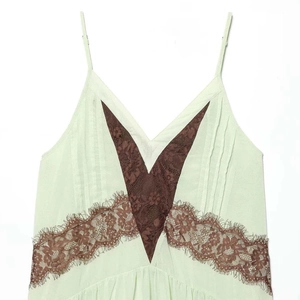 Light green camisole dress with dark brown lace trim and V-neckline in cotton texture