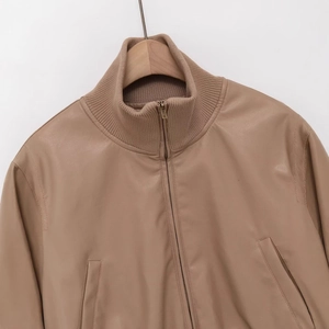 Chic camel faux leather jacket featuring a ribbed stand collar and smooth metal zipper